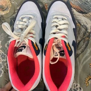 Nike Sneakers with White and Pink Accents